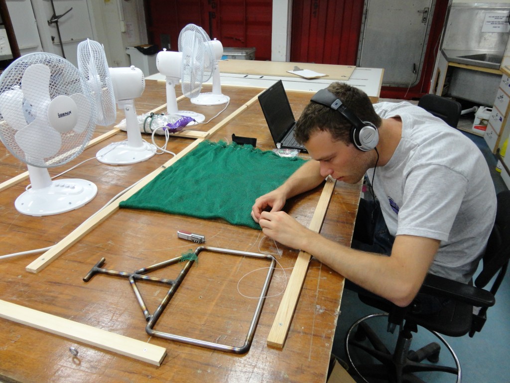 Pete's sewing in action (making nets to collect deep sea corals)_HC Ng